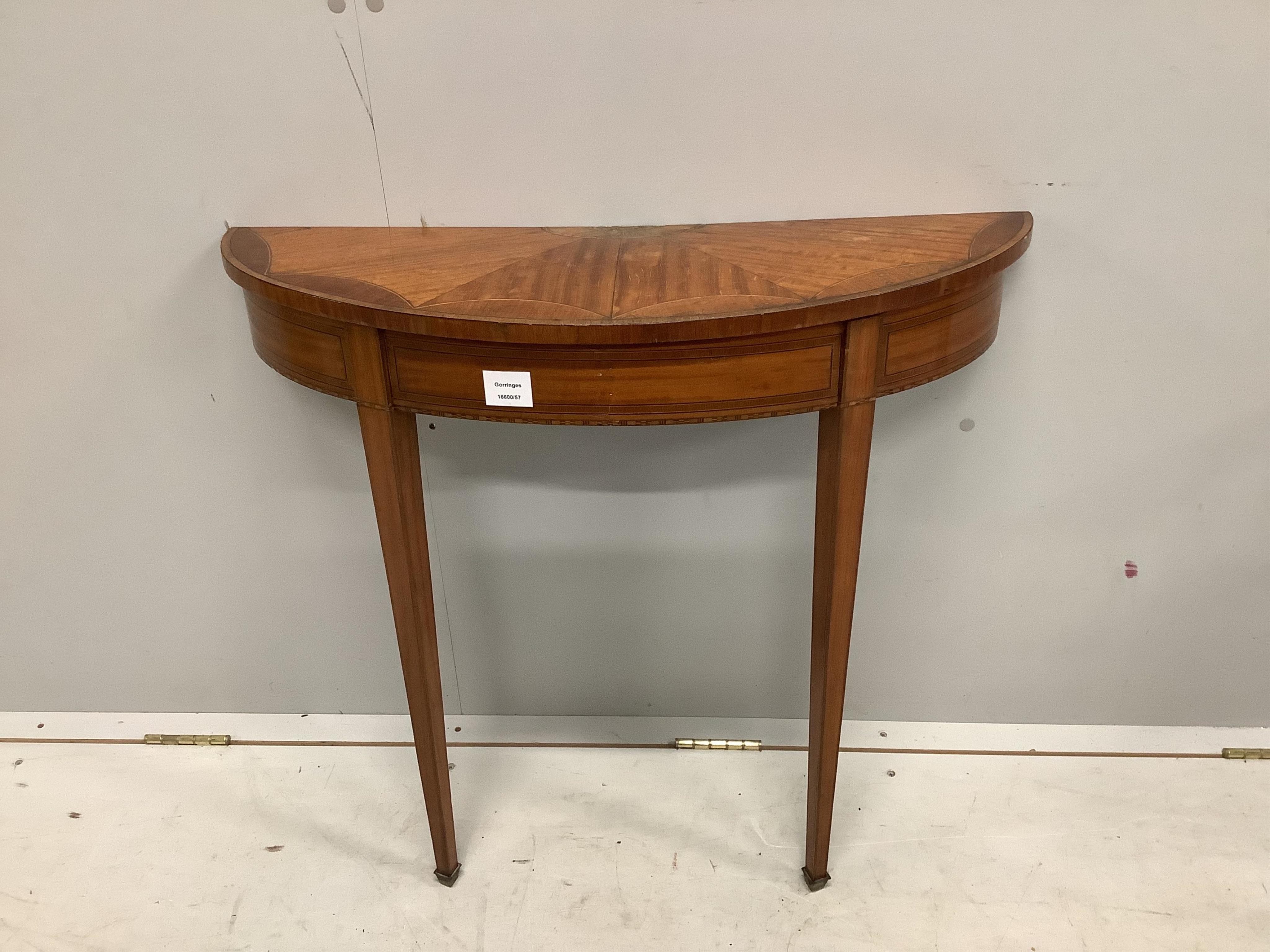 A small Sheraton style inlaid satinwood D shaped console table, width 76cm, depth 25cm, height 71cm. Condition - fair